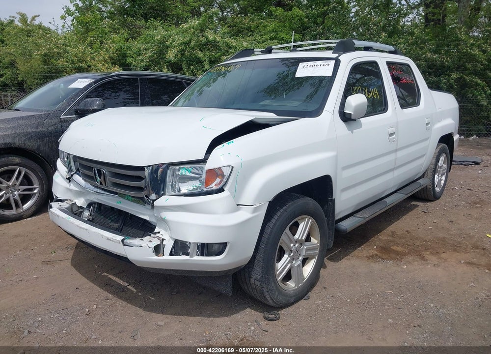 2012 HONDA RIDGELINE RTL VIN: 5FPYK1F57CB453096