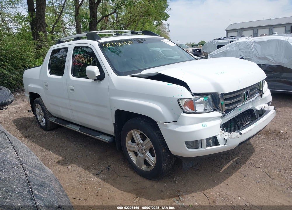 2012 HONDA RIDGELINE RTL VIN: 5FPYK1F57CB453096