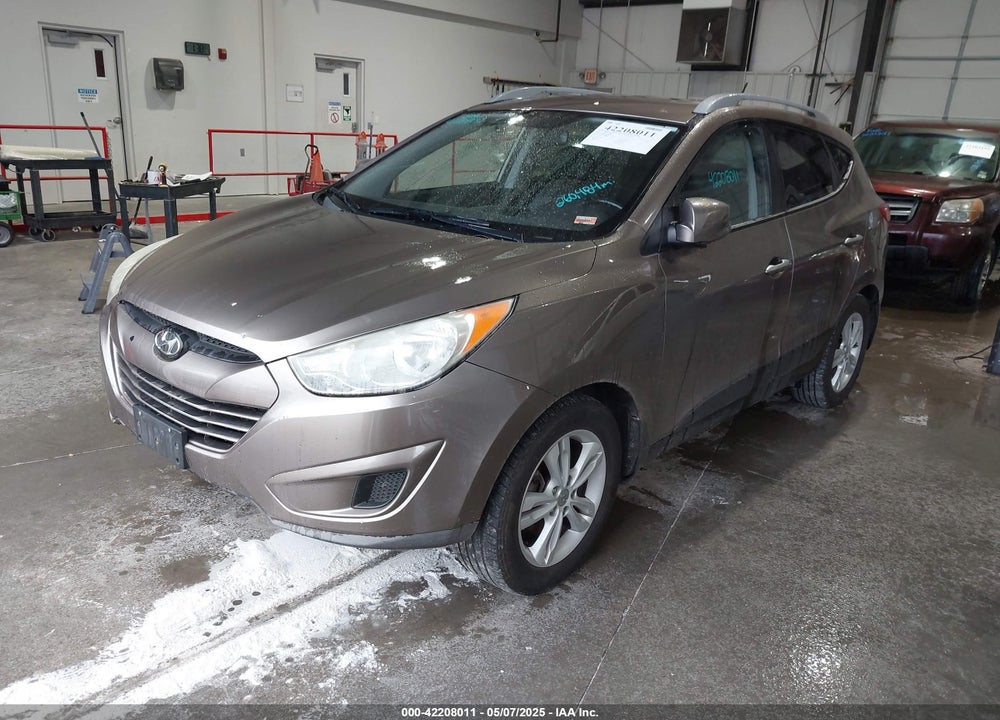 2010 HYUNDAI TUCSON VIN: KM8JU3AC5AU109658