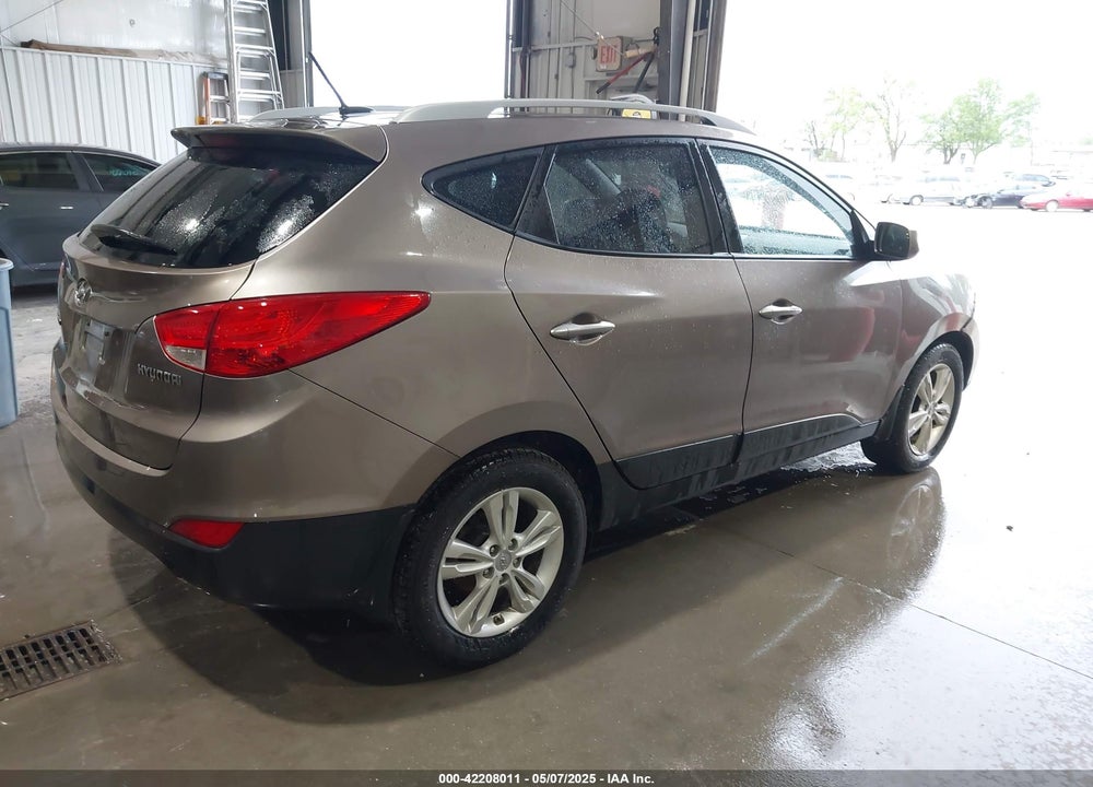 2010 HYUNDAI TUCSON VIN: KM8JU3AC5AU109658