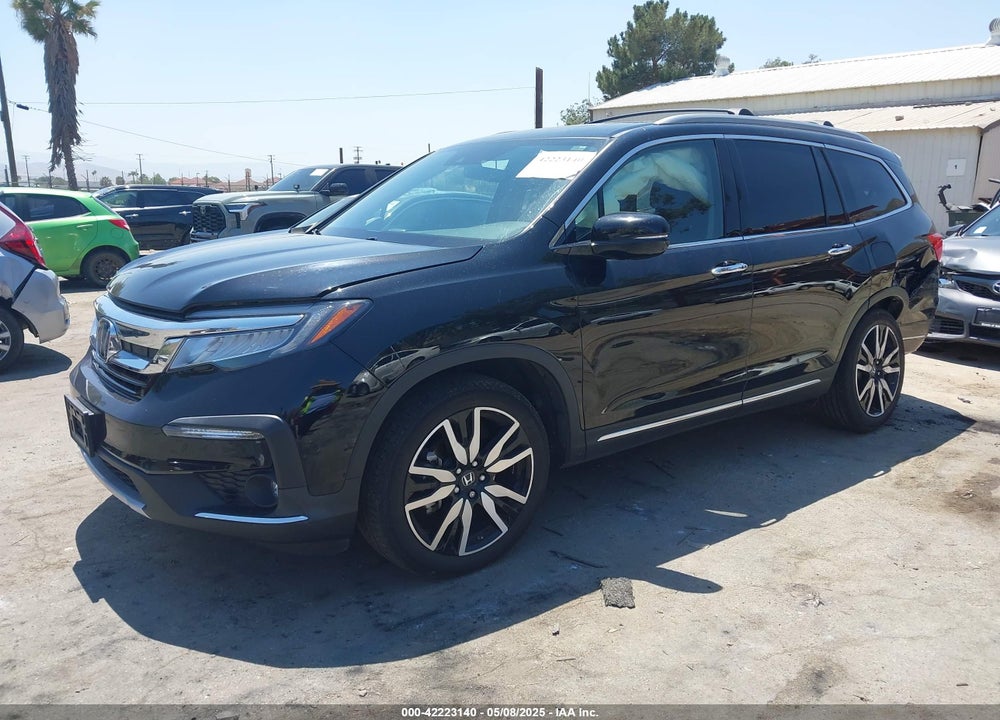 2022 HONDA PILOT 2WD TOURING 8 PASSENGER VIN: 5FNYF5H94NB004420
