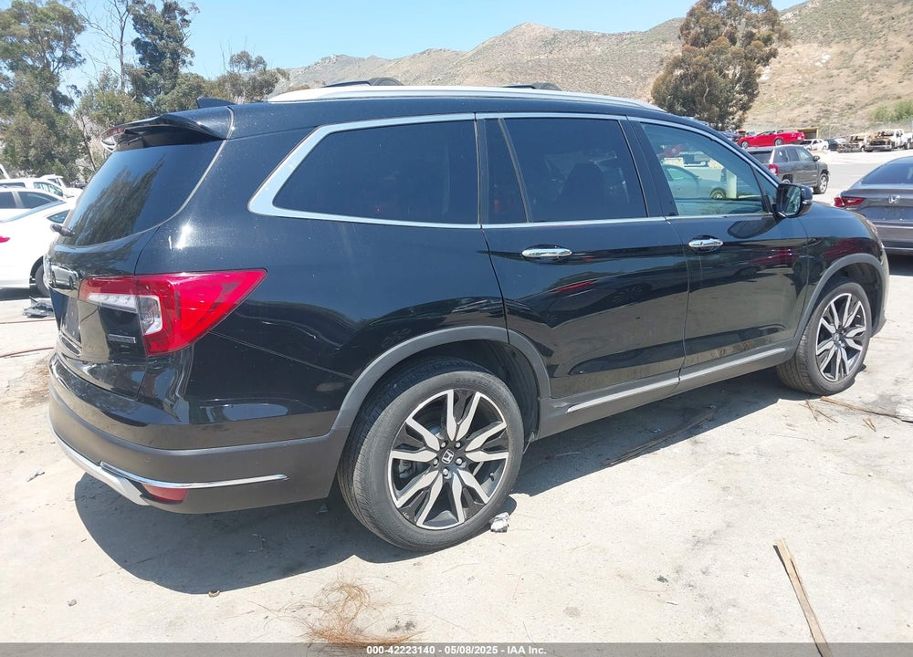 2022 HONDA PILOT 2WD TOURING 8 PASSENGER VIN: 5FNYF5H94NB004420