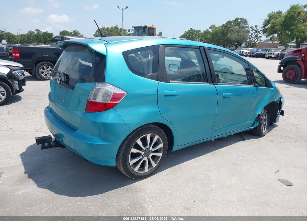 2012 HONDA FIT VIN: JHMGE8H57CC005793