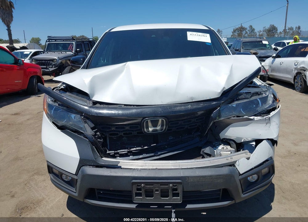 2021 HONDA PASSPORT 2WD SPORT VIN: 5FNYF7H28MB014400