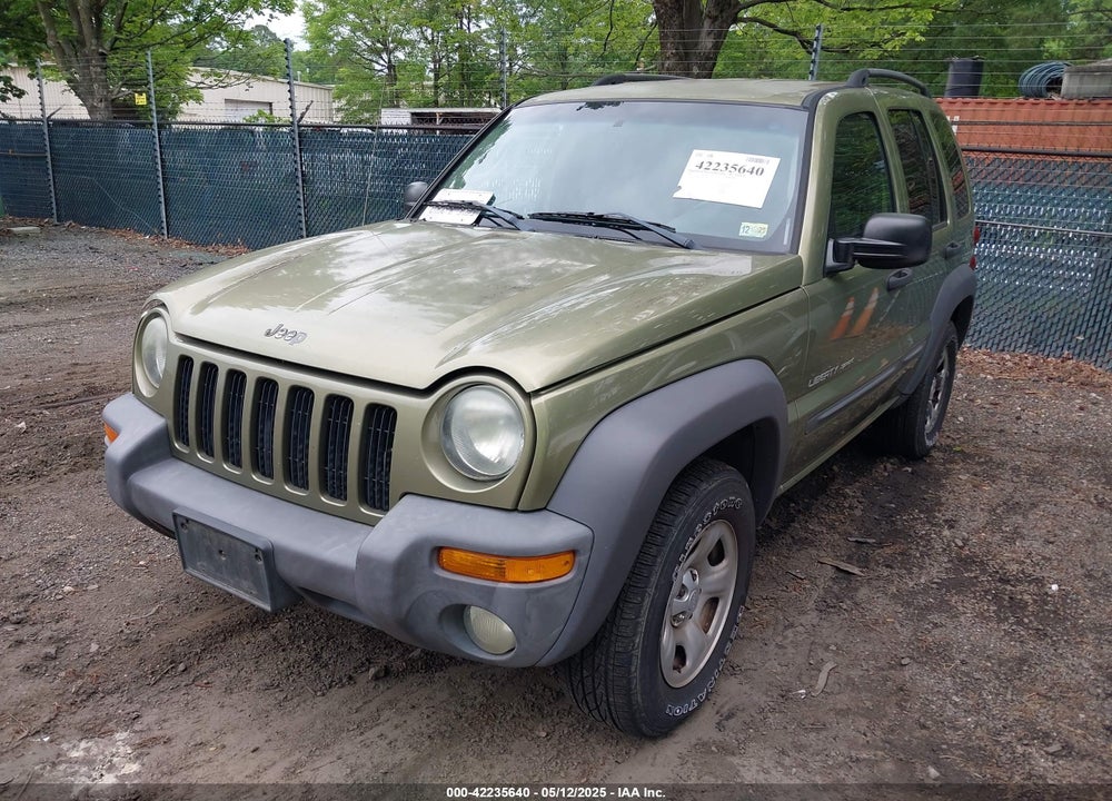 2003 JEEP LIBERTY SPORT VIN: 1J4GL48K73W734004