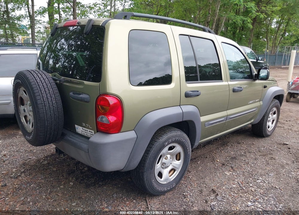 2003 JEEP LIBERTY SPORT VIN: 1J4GL48K73W734004