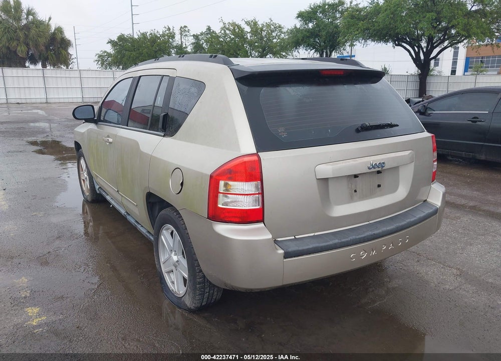 2010 SPORT JEEP COMPASS VIN: 1J4NT4FB8AD558082