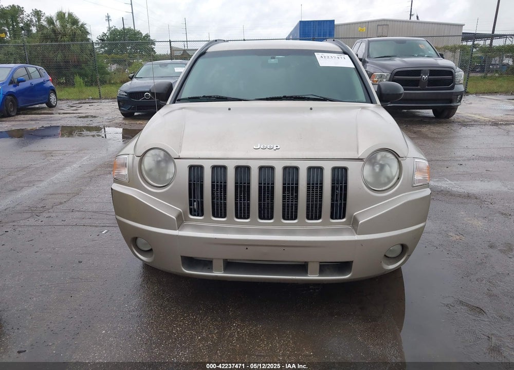 2010 SPORT JEEP COMPASS VIN: 1J4NT4FB8AD558082