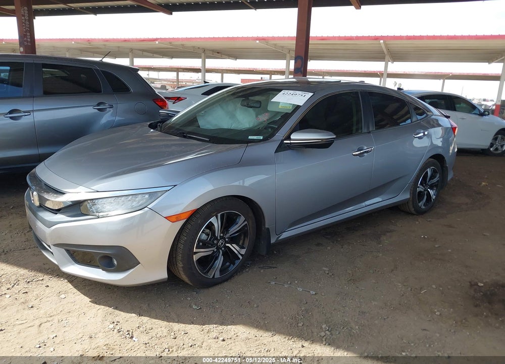 2016 HONDA CIVIC TOURING VIN: 2HGFC1F94GH649028