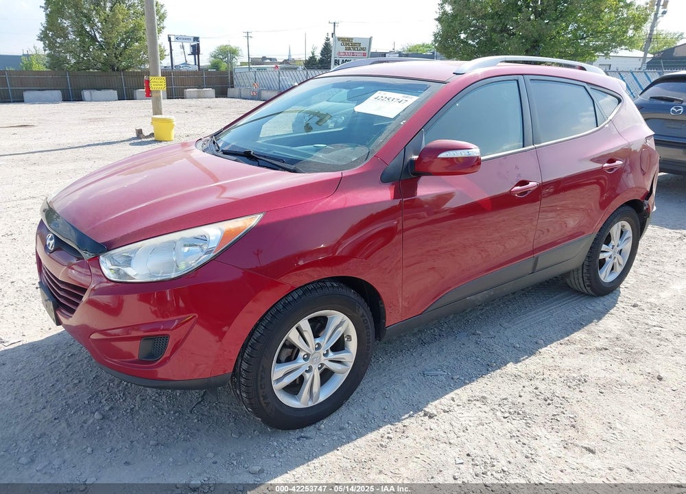 2012 HYUNDAI TUCSON VIN: KM8JUCAC8CU490781