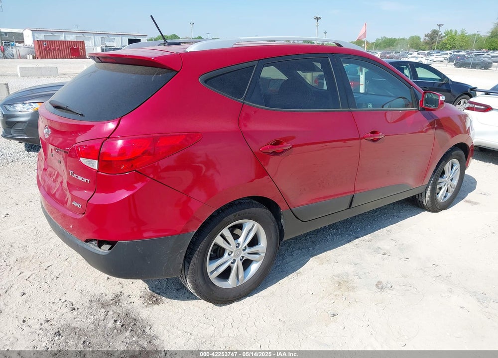 2012 HYUNDAI TUCSON VIN: KM8JUCAC8CU490781