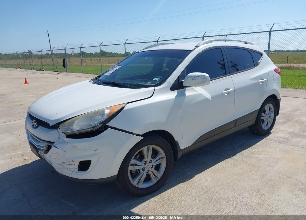2013 HYUNDAI TUCSON VIN: KM8JU3AC2DU690170