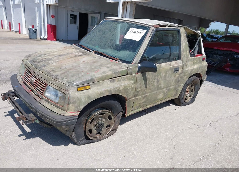 1995 GEO TRACKER VIN: 2CNBJ1869S6911342