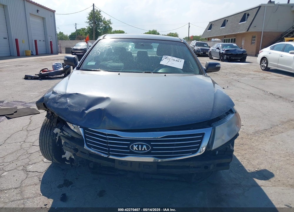 2009 KIA OPTIMA VIN: KNAGE228195295914