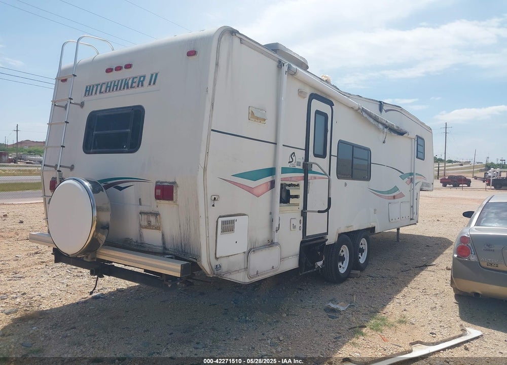 1999 NUWA HITCHHIKER VIN: 1C932JP09XA022080