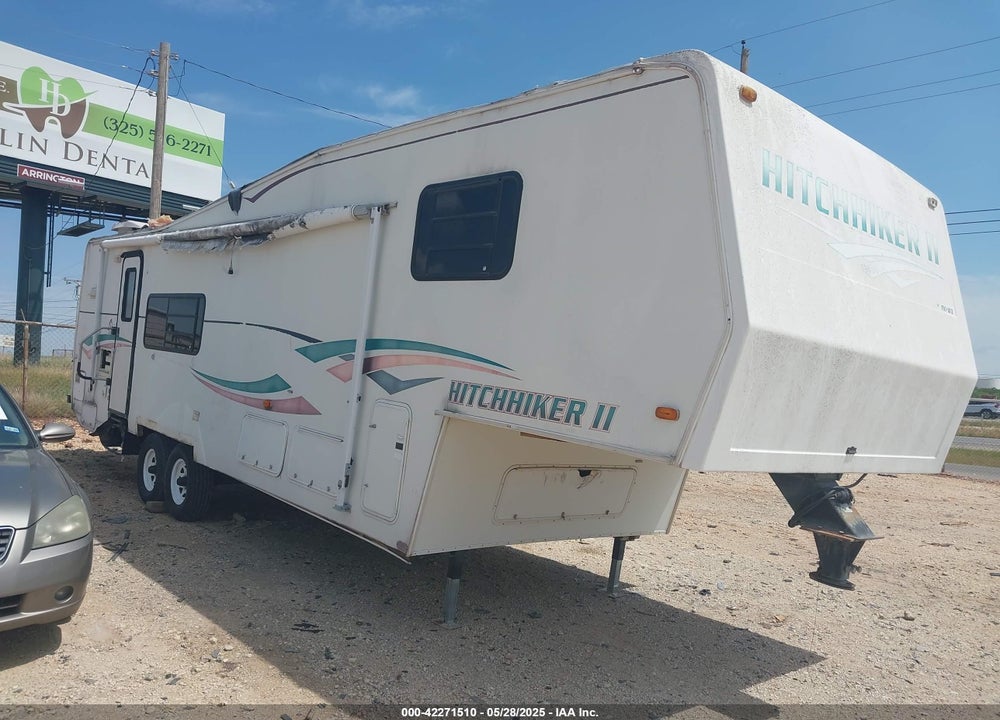 1999 NUWA HITCHHIKER VIN: 1C932JP09XA022080