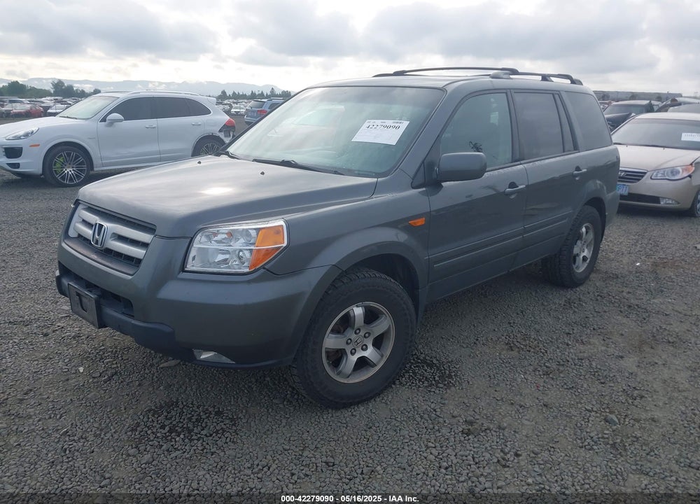 2007 HONDA PILOT EX-L VIN: 2HKYF18737H519100