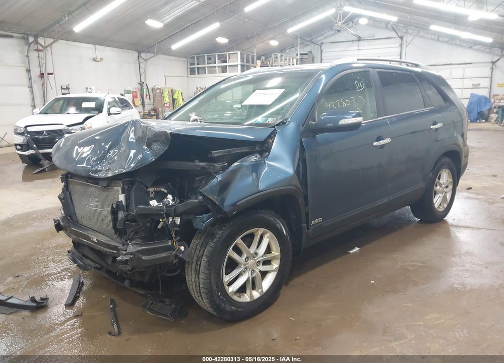 2015 KIA SORENTO LX VIN: 5XYKTCA66FG583066