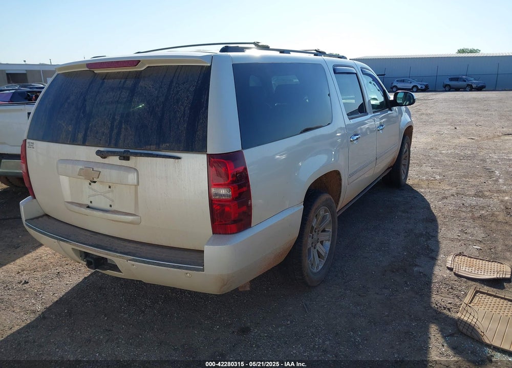 2010 CHEVROLET SUBURBAN 1500 VIN: 1GNUKKE36AR129309