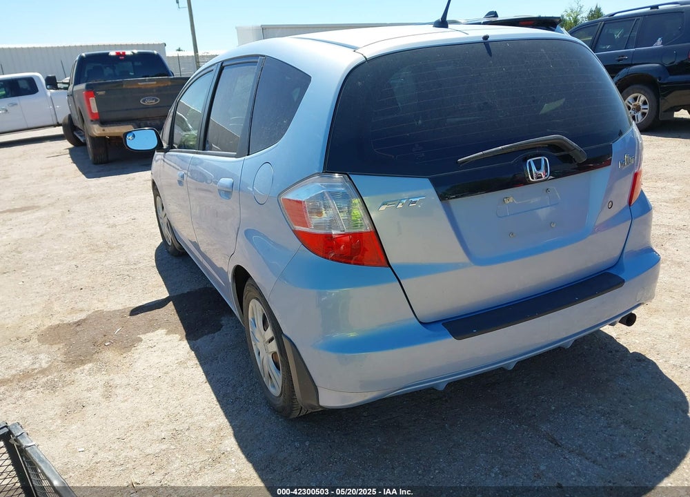 2009 HONDA FIT VIN: JHMGE88209S011973
