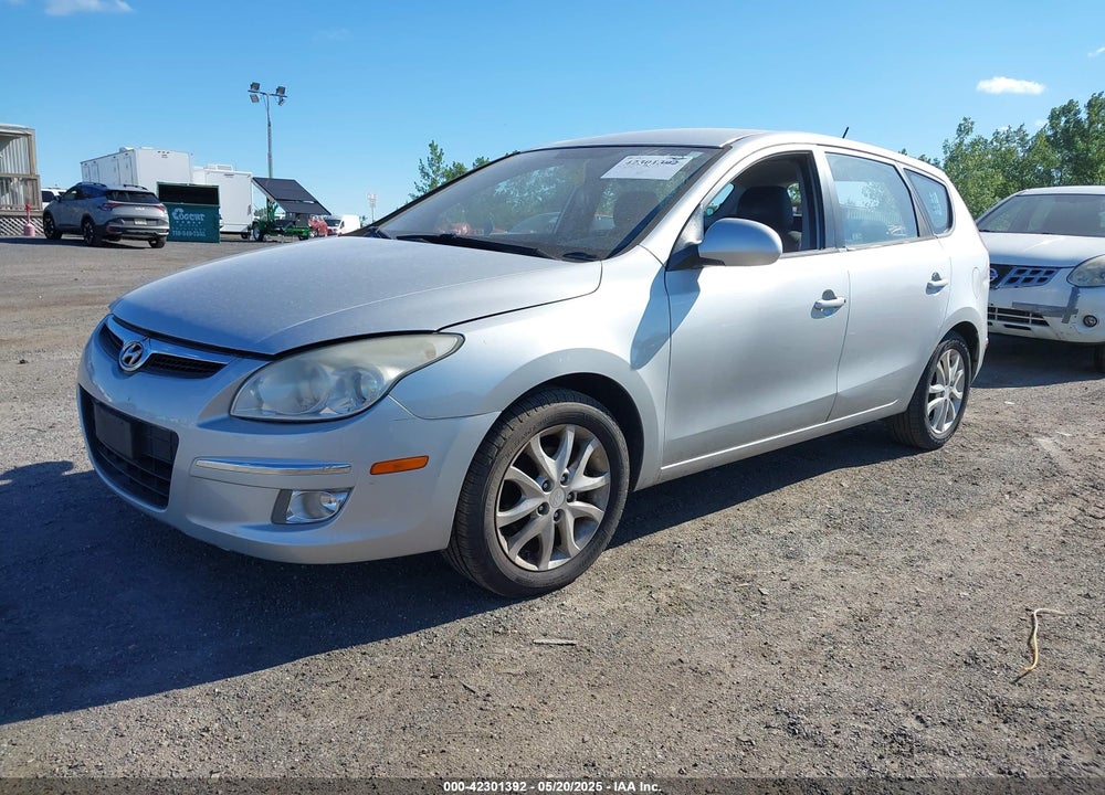 2009 HYUNDAI ELANTRA TOURING VIN: KMHDC86E99U033025
