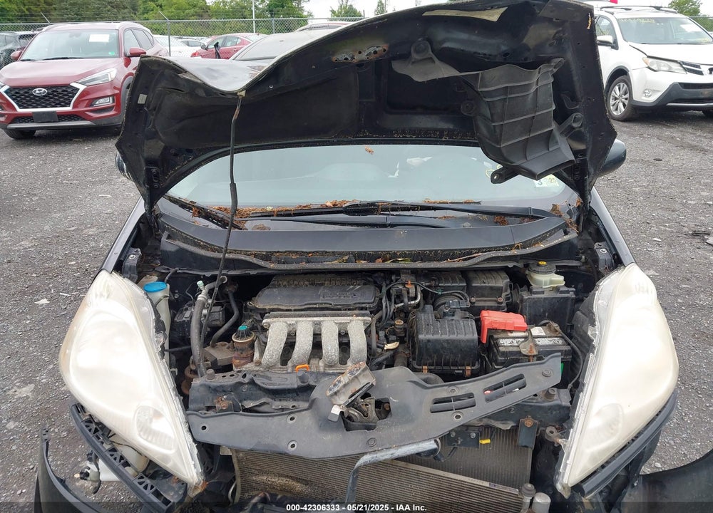 2009 HONDA FIT VIN: JHMGE88469S055316
