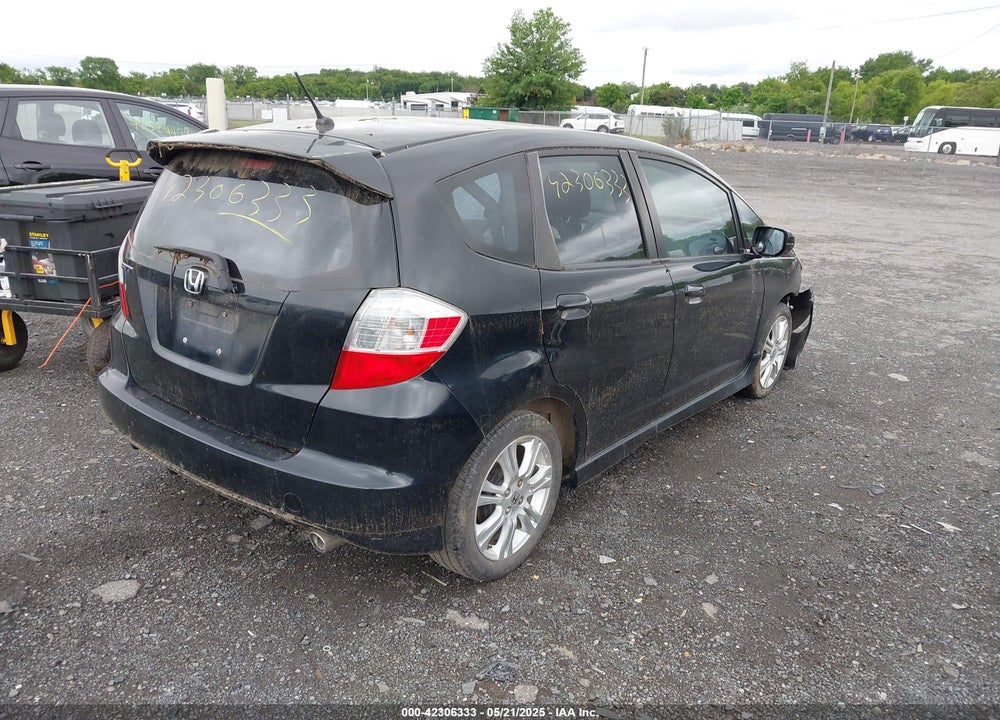 2009 HONDA FIT VIN: JHMGE88469S055316