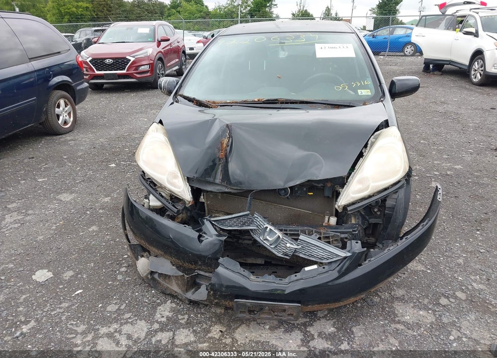 2009 HONDA FIT VIN: JHMGE88469S055316