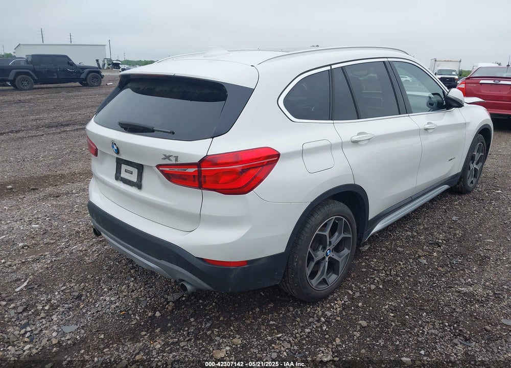 2016 BMW X1 VIN: WBXHT3C3XG5F67062