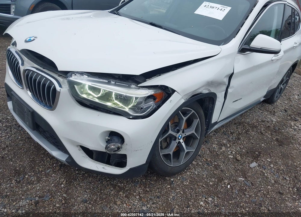 2016 BMW X1 VIN: WBXHT3C3XG5F67062