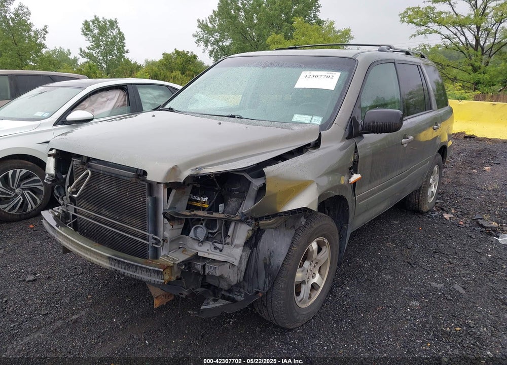 2007 HONDA PILOT EX-L VIN: 5FNYF18717B014686