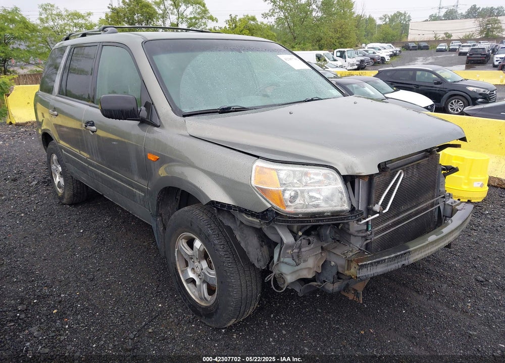 2007 HONDA PILOT EX-L VIN: 5FNYF18717B014686