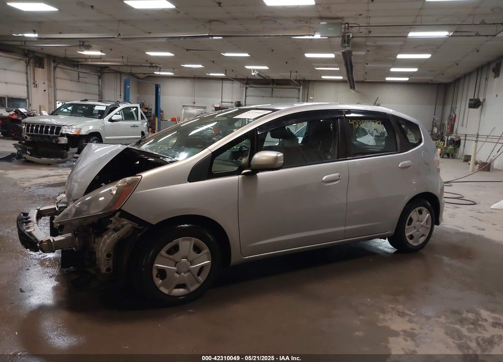2012 HONDA FIT VIN: JHMGE8H35CS008955