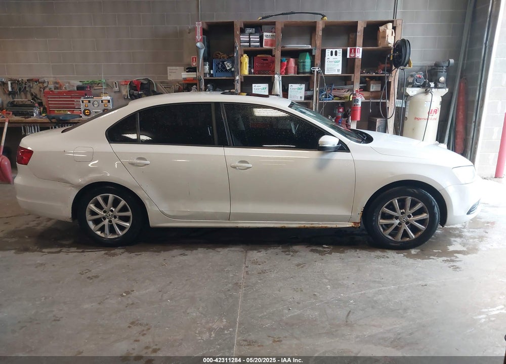 2011 VOLKSWAGEN JETTA VIN: 3VWDX7AJXBM315916
