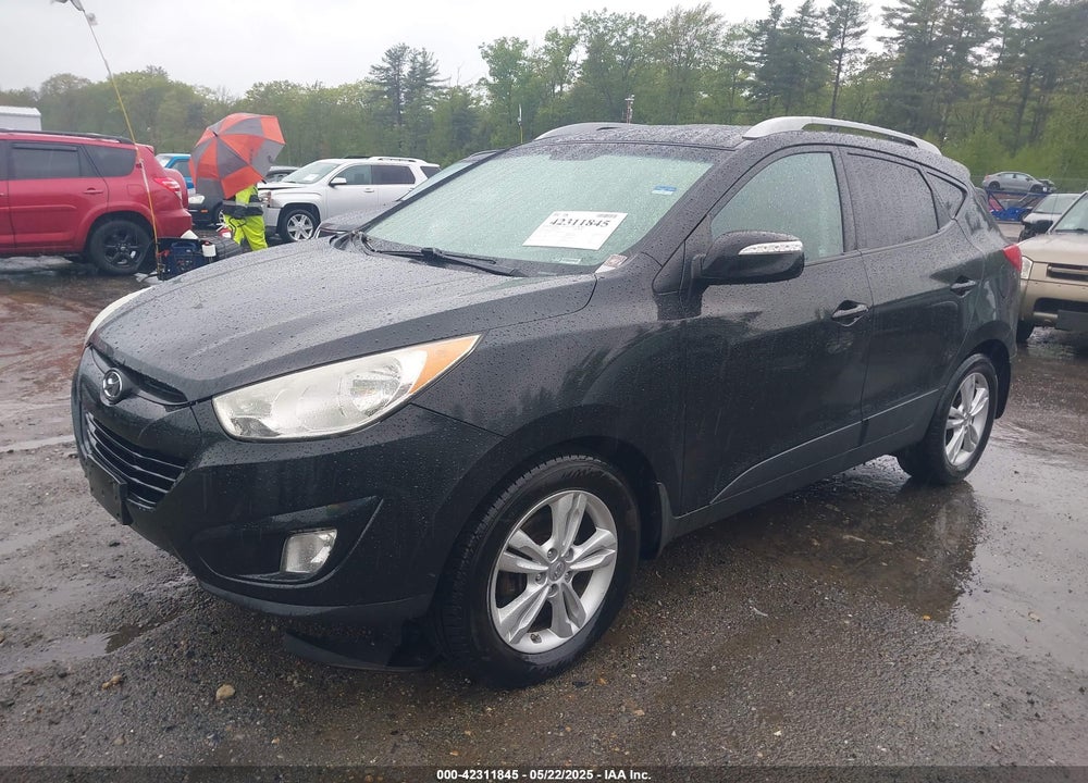 2013 HYUNDAI TUCSON VIN: KM8JUCAC2DU564794
