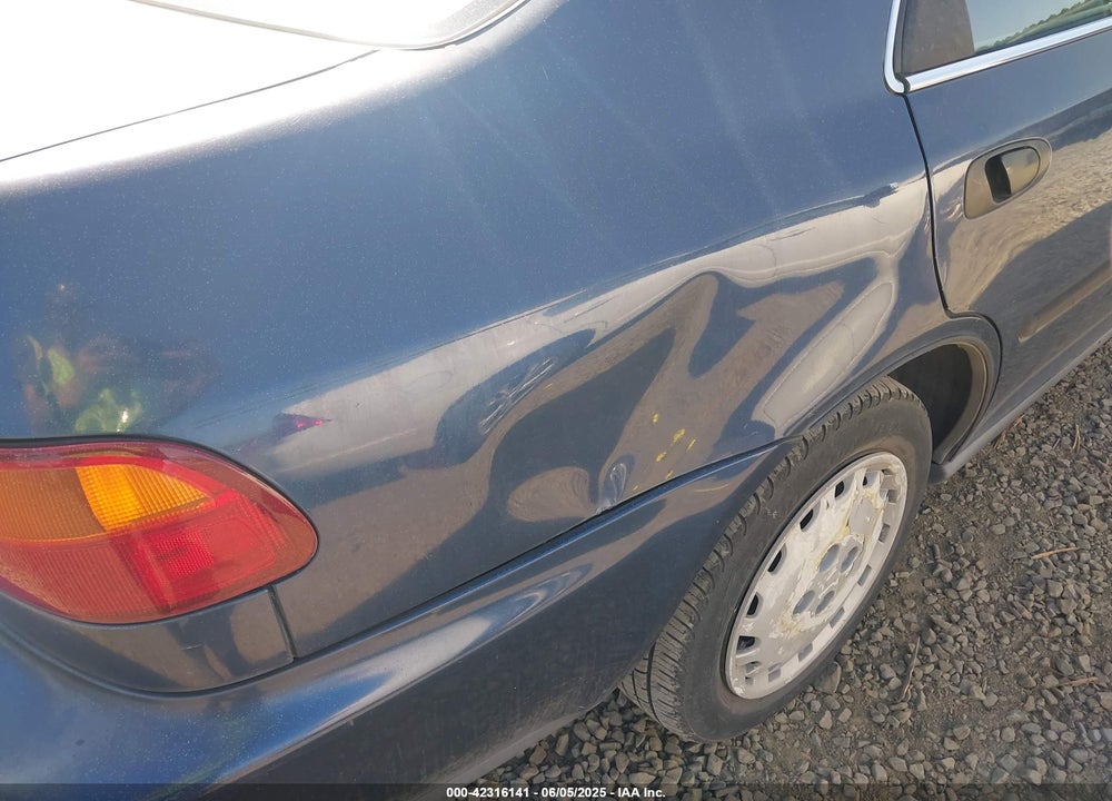 1995 HONDA CIVIC LX VIN: 1HGEG8558SL027731