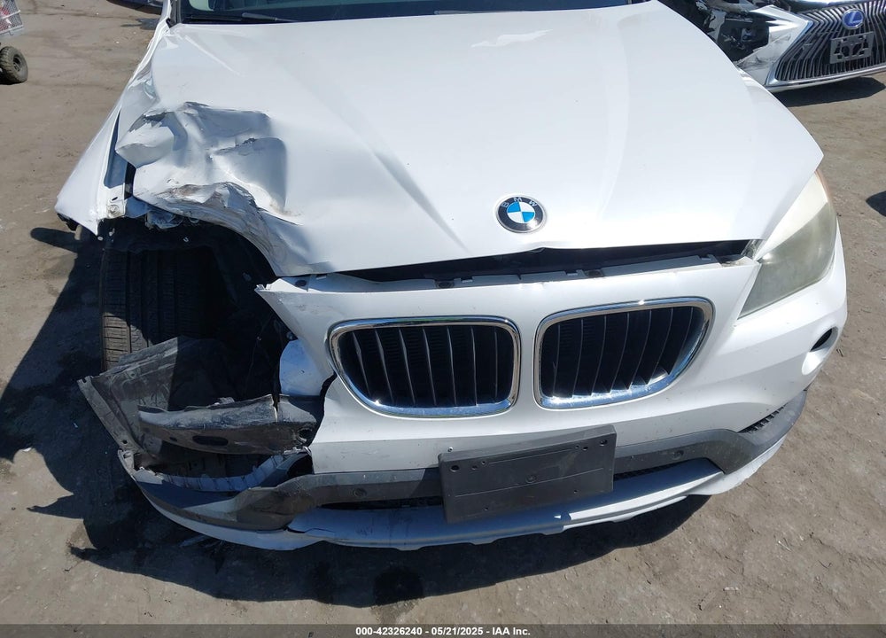 2015 BMW X1 VIN: WBAVM1C5XFV315999
