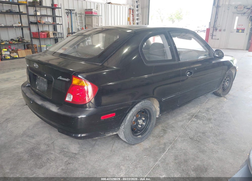 2003 HYUNDAI ACCENT VIN: KMHCF35CX3U260852