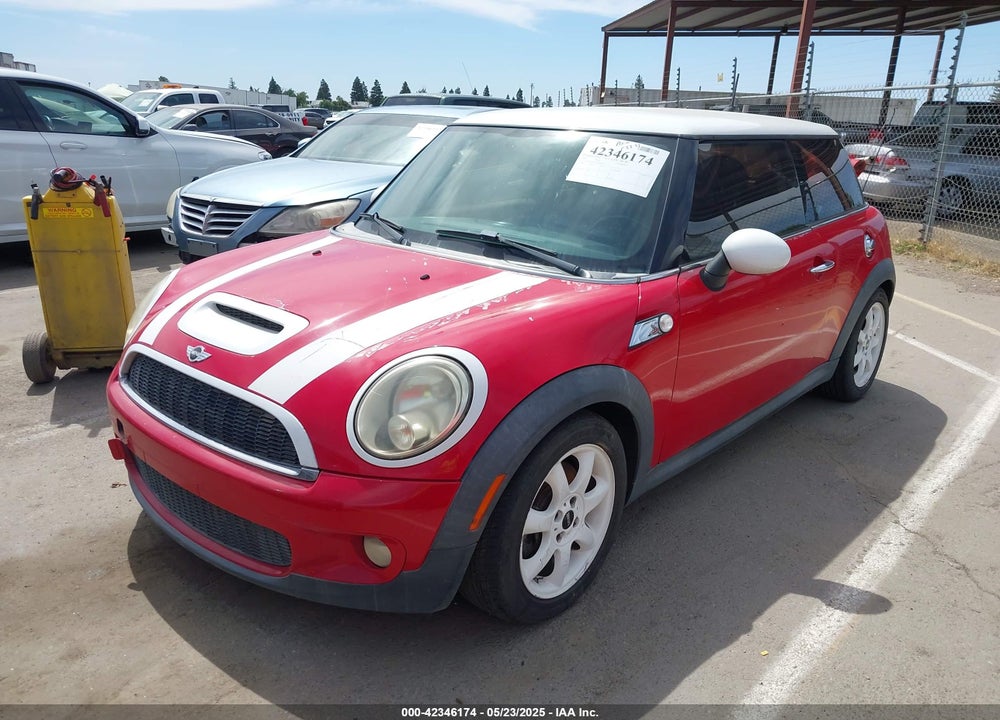 2009 MINI COOPER S VIN: WMWMF73559TW87548