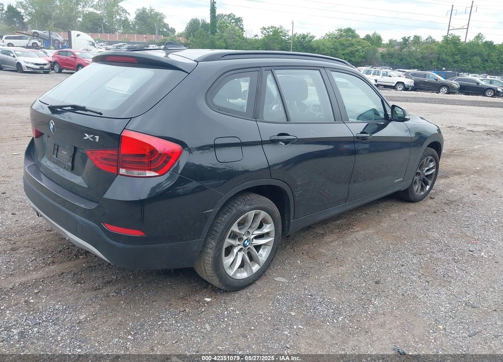 2015 BMW X1 VIN: WBAVL1C54FVY35473