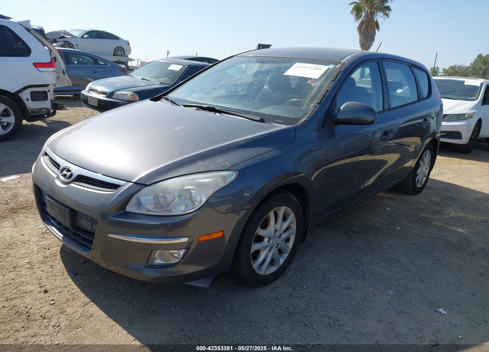 2009 HYUNDAI ELANTRA TOURING VIN: KMHDC86E39U021534