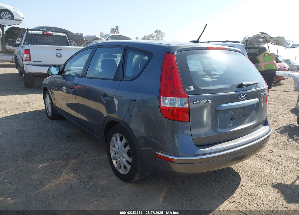 2009 HYUNDAI ELANTRA TOURING VIN: KMHDC86E39U021534