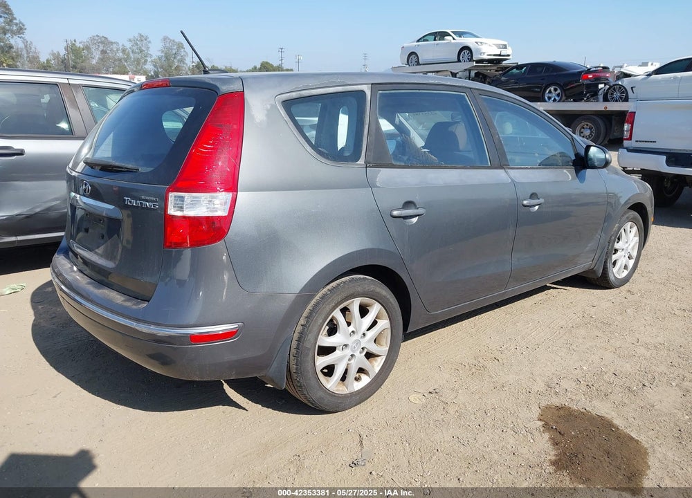 2009 HYUNDAI ELANTRA TOURING VIN: KMHDC86E39U021534