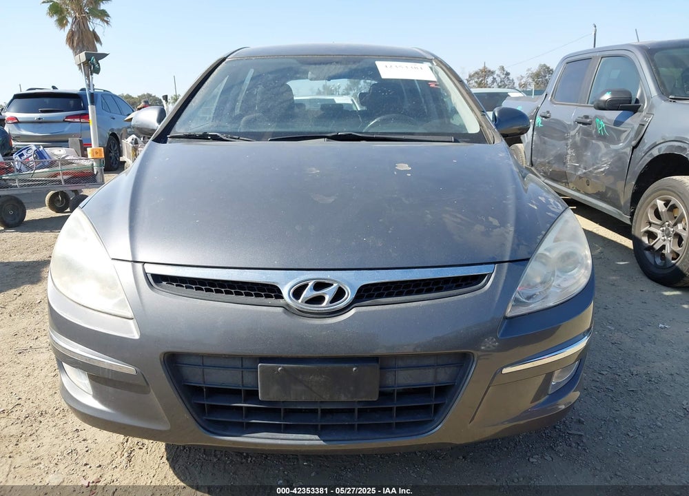 2009 HYUNDAI ELANTRA TOURING VIN: KMHDC86E39U021534