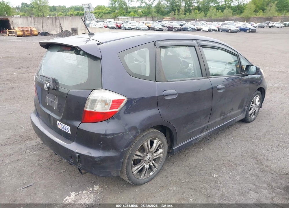 2009 HONDA FIT VIN: JHMGE87679S043551