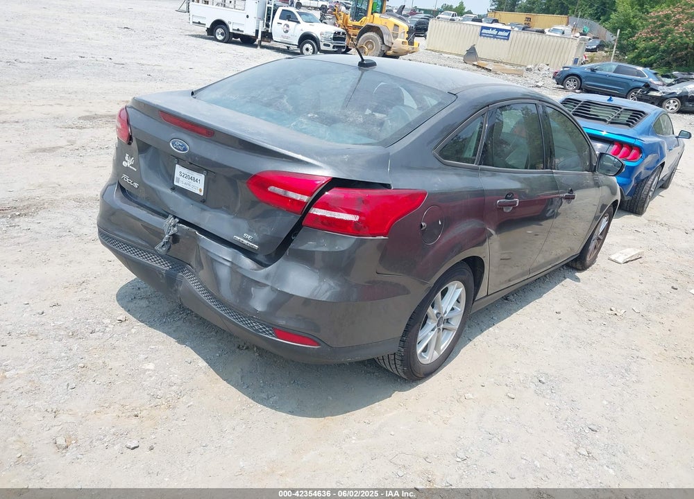 2016 FORD FOCUS SE VIN: 1FADP3F29GL401567