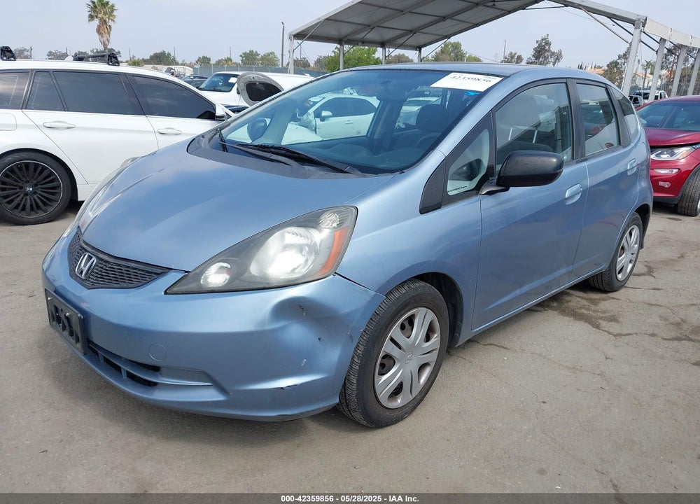 2011 HONDA FIT VIN: JHMGE8H30BC016731