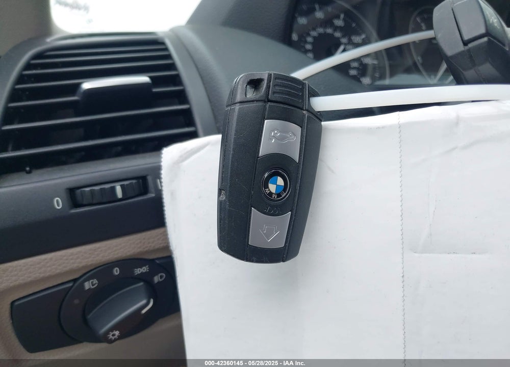 2009 BMW 128I VIN: WBAUP93599VF48622
