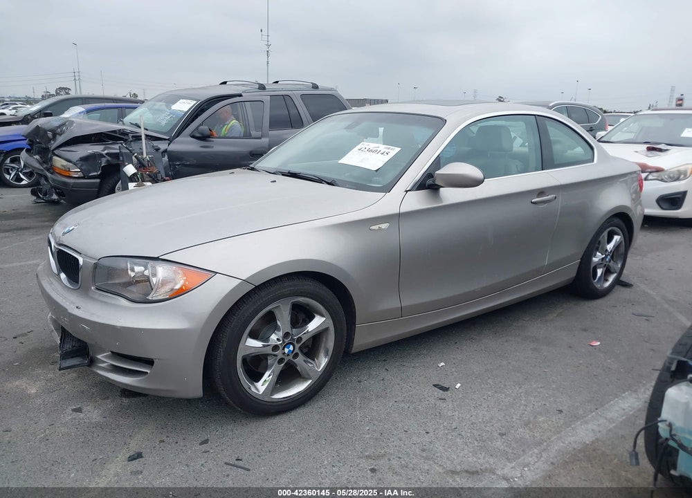 2009 BMW 128I VIN: WBAUP93599VF48622