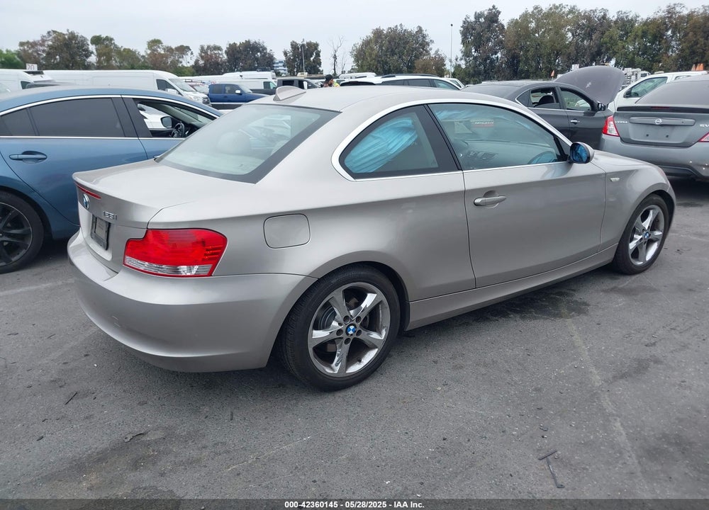 2009 BMW 128I VIN: WBAUP93599VF48622